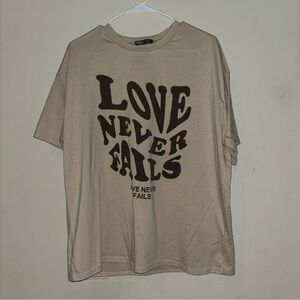Love Never Fails Graphic T